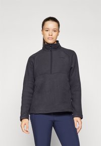 Pull à col montant en polaire gris foncé avec fermeture éclair quart de tour. Il présente une texture lisse et un logo discret sur la poitrine.