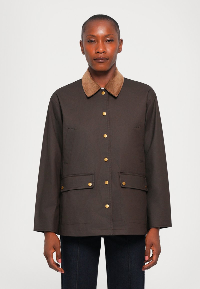 Brown jacket with a tan corduroy collar, gold snap buttons, two front pockets, and a relaxed fit design. Smooth texture and minimal detailing.