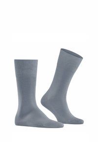 Calzini di cotone grigi con fascia superiore a coste, texture liscia e lunghezza classica, esposti in coppia.