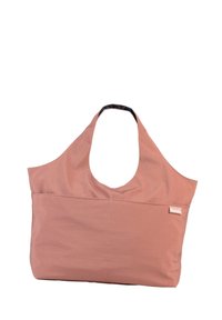 Sac en tissu rose avec un design large et ouvert et une seule bandoulière. Comprend une poche avant et une doublure à motif sombre.