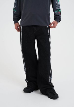 DRAGON RAW SEAM - Straight leg jeans - black
