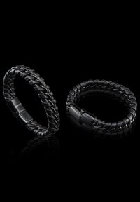 Black braided leather bracelet with a glossy clasp; features a textured, woven design and smooth finish on the hardware.