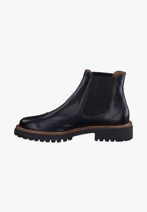 Bottine chelsea en cuir noir avec des panneaux élastiques sur les côtés, des détails en brogue sur le bout et une semelle en caoutchouc robuste. Design classique avec un contour marron contrasté.