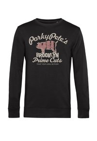 Felpa nera a maniche lunghe in cotone. Sul davanti presenta una grande grafica di un maiale con la scritta "PorkyPete's Brooklyn Prime Cuts" in beige.