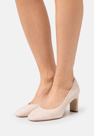 Klassiske pumps - ivory