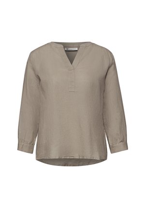 Beżowa bluzka z długim rękawem, kołnierzem w kształcie litery V i guzikami na mankietach, wykonana z lekkiego, teksturowanego materiału.