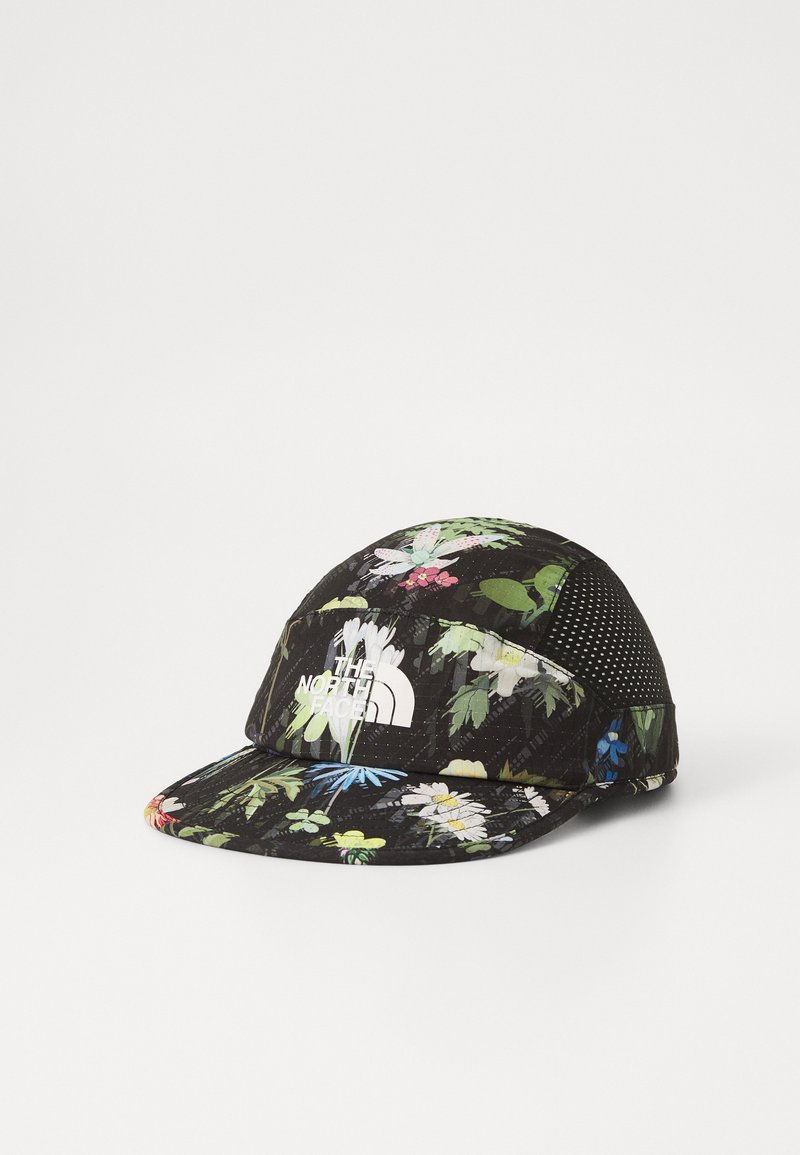 Blomstermønstret caps i sort, med meshpanel, flad skygge og hvidt logo. Lavet af letvægtsstof med tekstureret overflade.