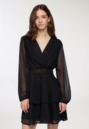 CON BALZE E MANICHE LUNGHE - Vestito elegante - nero