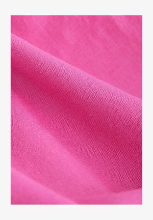 Helles pinkes texturiertes Gewebe mit einer weichen, gewebten Optik, das eine glatte Oberfläche und subtile Farbvariationen zeigt.