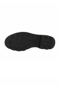 Suola di scarpa nera in gomma con un motivo testurizzato, caratterizzata da sezioni rialzate e scanalature per una migliore aderenza. Forma ovale con punte arrotondate.
