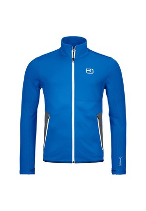 Blue fleece jacket with high collar, white zipper, and gray side pockets. Features a logo on the upper left chest, smooth texture.