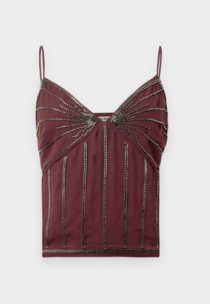Burgunderfarget camisole med tynne stropper, perledetaljer og vertikale linjer. Myk stoffkvalitet med en tettsittende design og teksturerte detaljer.
