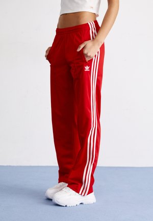 FIREBIRD LOOSE - Tracksuit bottoms - better scarlet