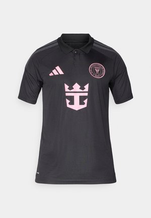 Black polo shirt with pink logo and crown design, made from breathable fabric. Features Adidas stripes on shoulders and a classic collar.