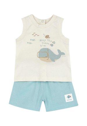 T-shirt à manches courtes couleur crème avec motif de baleine et texte, assorti à un short bleu clair. Confectionné en tissu de coton doux, l'étiquette est décorée d'un design de poisson.