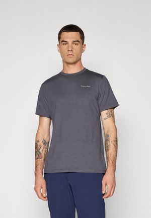 Graues Rundhalsausschnitt-T-Shirt aus weichem Stoff, mit kurzen Ärmeln und einem dezenten Calvin Klein-Logo auf der Brust.