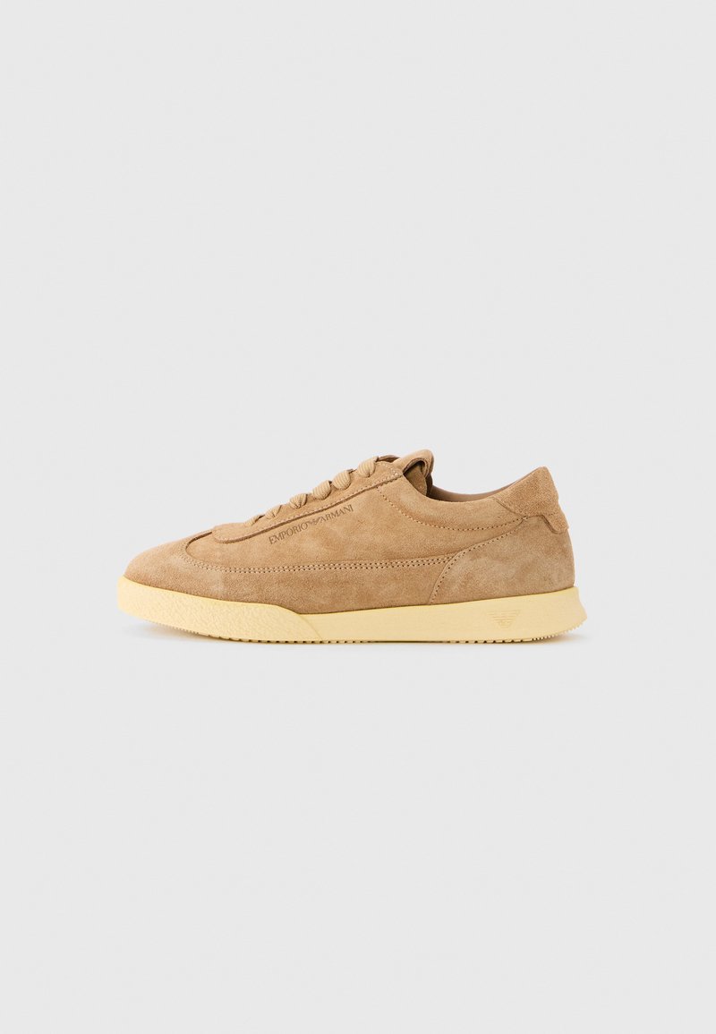 Light brown suede sneaker with lace-up closure and off-white textured sole, Emporio Armani logo on side and embossed on sole.