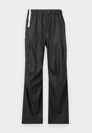 RAIN WIDE UNISEX - Oldalzsebes nadrágok - black