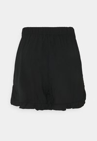 Shorts à taille élastique pour femme noire avec ourlets volantés, vus de dos sur un fond blanc.