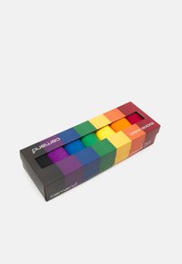 Seven pairs of crew socks in a box, featuring a gradient of vibrant colors: purple, blue, green, yellow, orange, red, and pink.