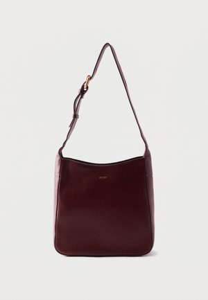 Dark burgundy leather shoulder bag with adjustable strap and subtle gold "JOOP!" logo on front center.