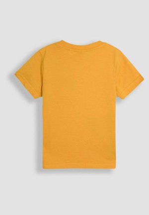 T-shirt z krótkim rękawem i okrągłym dekoltem w jasnym żółtym kolorze, o prostym fasonie bez wzorów i grafik.