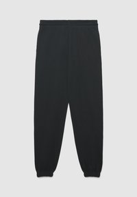 Schwarze Jogginghose aus weichem Stoff, mit einem elastischen Bund und elastischen Bündchen an den Knöcheln. Minimalistisches Design ohne sichtbare Muster.