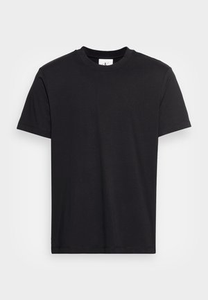 Czarny bawełniany t-shirt z krótkim rękawem, okrągłym dekoltem i prostym wzornictwem bez wzorów czy grafik. Gładka faktura.