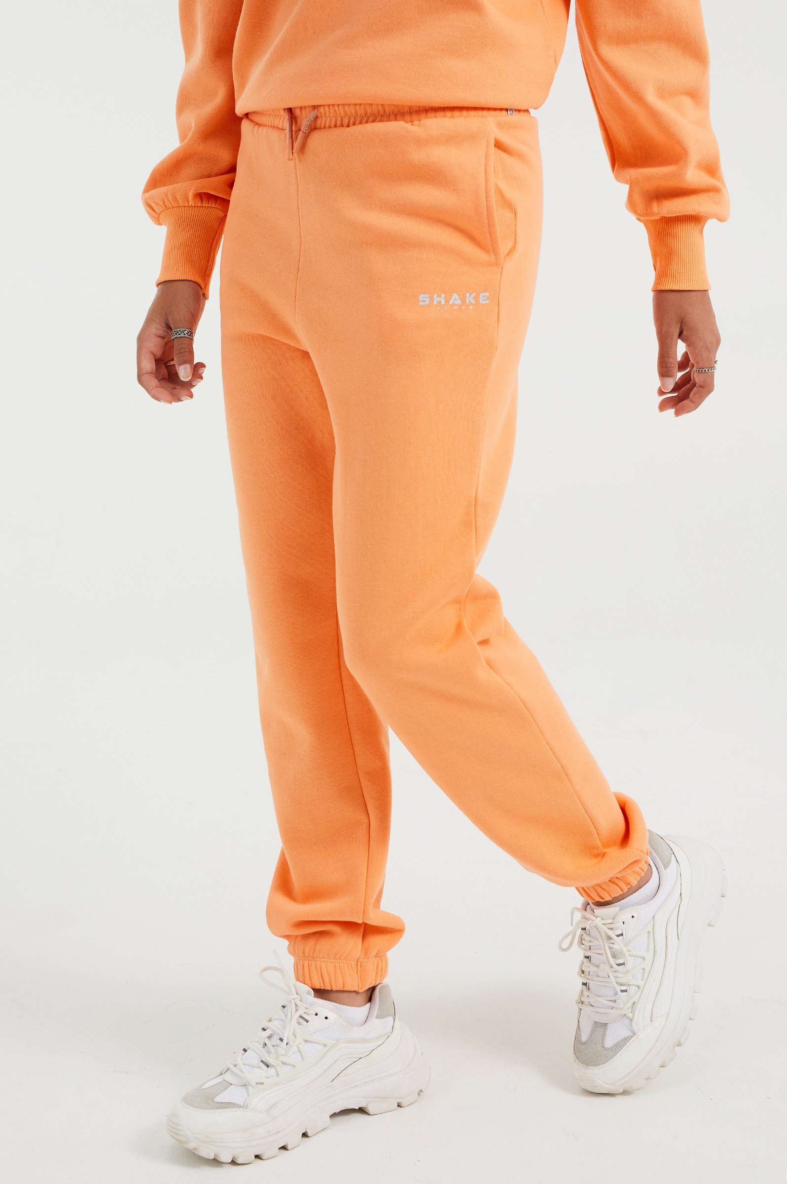 WE Fashion MET OPDRUK - Pantaloni sportivi - pink/rosa salmone - Zalando.it