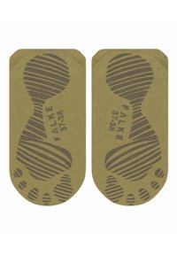 Skarpetki bawełniane w oliwkowym kolorze z teksturowanym wzorem w strefie stopy w ciemnoszarym kolorze. Posiadają zaokrąglone krawędzie oraz nadrukowaną nazwę marki "FALKE" na podeszwie.