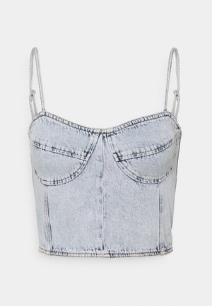 Lichtblauw acid wash denim cropped tanktop met dunne verstelbare bandjes en gestructureerde buste naden.
