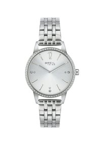 Sølv rustfrit stål ur med en glat, lys sølvskive, en krystalbesat bezel og et metalledarmbånd.