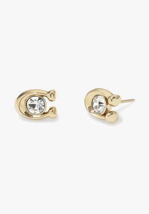 Gouden stud oorbellen met een cirkelontwerp en een centrale heldere rhinestone, verfraaid met twee kleine bolvormige elementen.