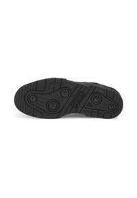 Puma skosål, sort gummi, med tekstureret grebsmønster, cirkulære og vinklede detaljer, bred form for stabilitet og brandlogo.