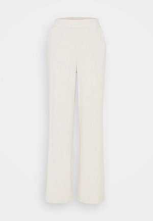 Šviesiai béžiniai lininiai kelnių su tiesiu kojų dizainu, plokščiu juosmeniu ir minimaliais siuvimo detalėmis, suteikiančiais minkštą ir tekstūruotą apdailą.