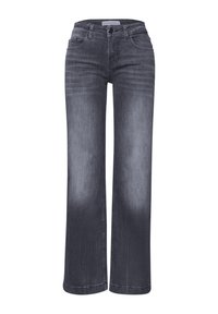 Tummanharmaat leveälahkeiset farkut, joissa on etutaskut, vyölenkit ja napillinen kiinnitys sekä haalistuneita yksityiskohtia reisissä ja polvissa.