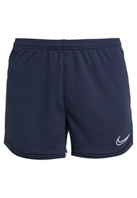 Mörkblå sportshorts i slätt tyg, med ett elastiskt midjeband och vit Nike-logotyp på nedre högra sidan.