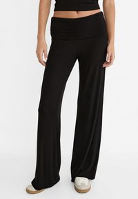 Stradivarius WIDE-WITH FOLD-DOWN WAIST - Kalhoty - black