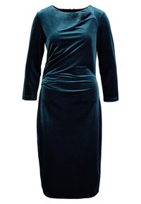 Mörk teal, figursydd klänning med långa ärmar, rund halsringning och samlad detalj fram, tillverkad av mjukt sammetmaterial.