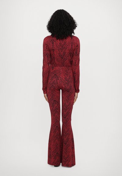 Stieglitz MISO FLARED LEGGINGS - Leggings - Trousers - red