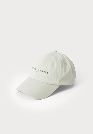 Casquette de baseball vert clair avec le logo brodé "TOMMY JEANS" à l'avant, visière incurvée et oeillets de ventilation sur les côtés.