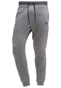 Gray cotton sweatpants with a black elastic waistband and drawstring. Features a small logo patch on the left thigh and fitted cuffs.