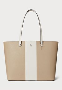 Beige tote bag with a white vertical stripe. Made of textured material, featuring long handles and silver-tone hardware. Logo centered on the stripe.