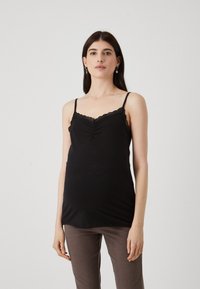 Black camisole with lace trim, fitted design and thin shoulder straps. Smooth fabric with a slight sheen, complemented by a gathered detail at the front.