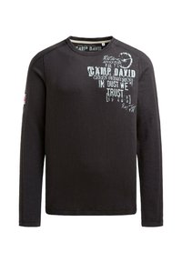 Schwarzes Sweatshirt mit langen Ärmeln und Rundhalsausschnitt, mit weißen grafischen Texten und Designs auf der Vorderseite, aus einem weichen, strukturierten Stoff gefertigt.