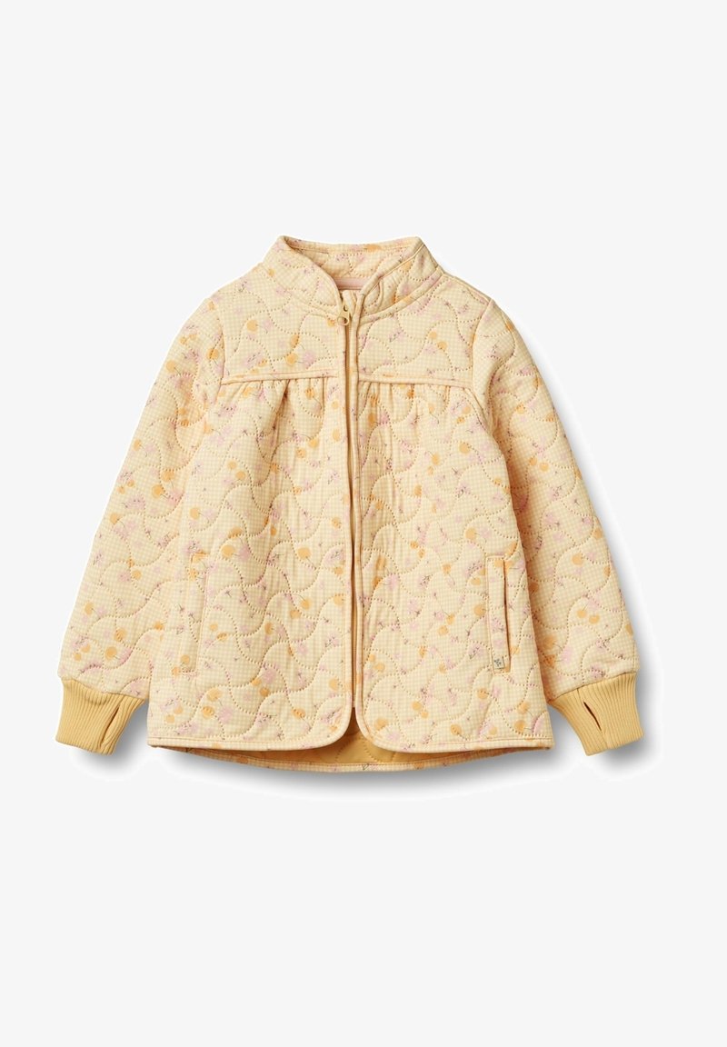 Vaahtokankainen keltainen takki, jossa on teksturoitu kuvio pienistä kukista, pystykaulus, vetoketjusulku ja ribbatut hihansuut. Kevyt malli.