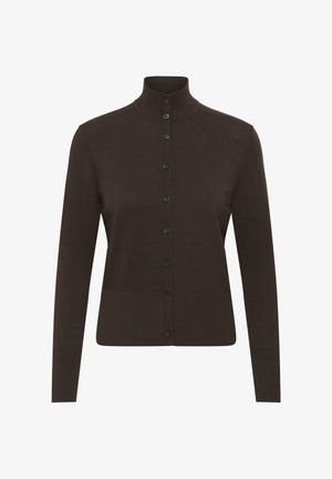 Tumeda pruuni kardiganiga, millel on kõrge kaelus ja täispikkuses varrukad. Esiosas nupud ja lisatasku, mis lisavad funktsionaalseid detaile. Sile kudumispind.