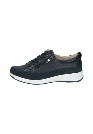Basket en cuir noir avec fermeture éclair latérale, lacets noirs et semelle blanche, vue du côté extérieur.