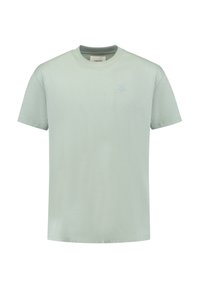 Lichtgroene katoenen t-shirt met een ronde hals, korte mouwen en een klein geborduurd logo op de borst. Zacht materiaal en een ontspannen pasvorm.