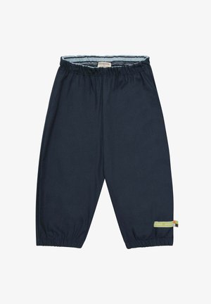 Marineblauwe kinderbroeken van zacht materiaal, met een elastische tailleband en opgerolde uiteinden. Inclusief een klein gekleurd label aan de zijkant.